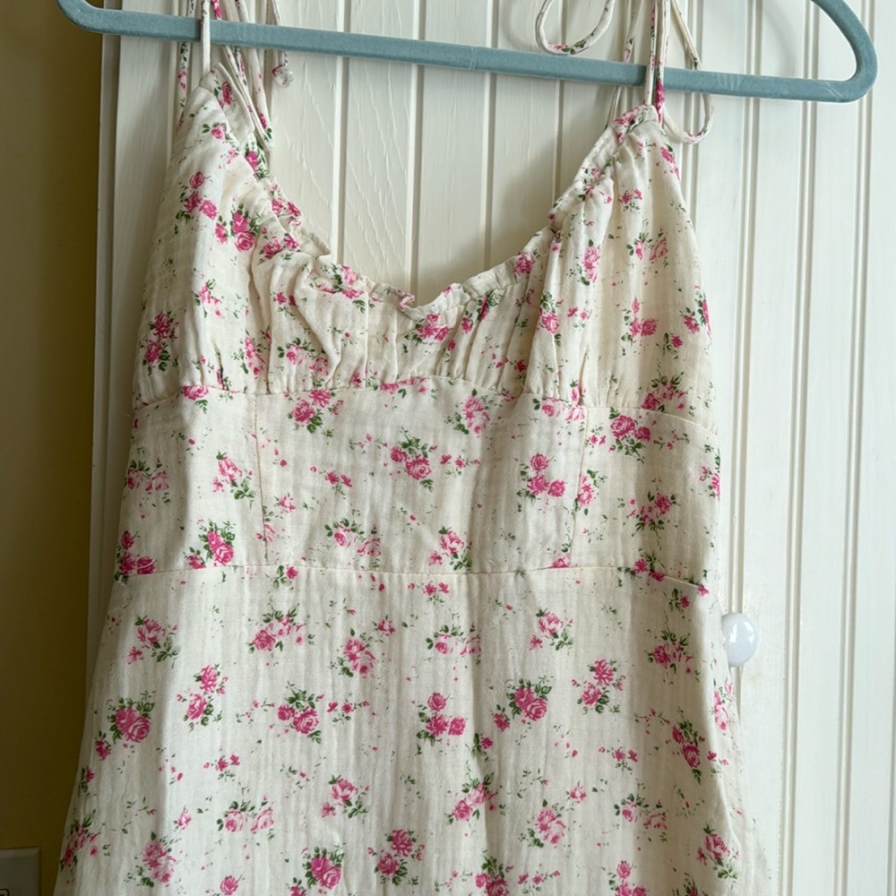 Olivacious NWT mini dress . Spaghetti strap size M but runs small